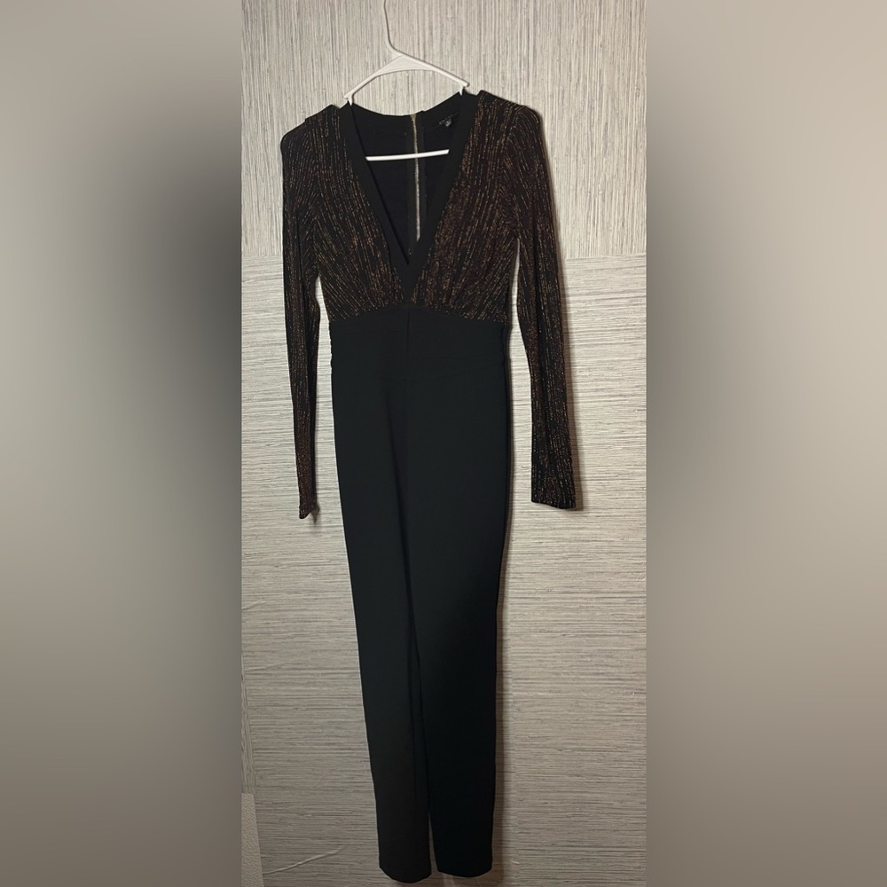 Sparkling night out jumpsuit. Black and Gold
